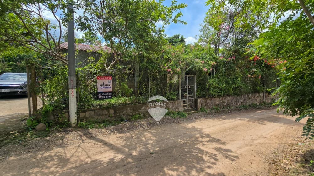 TERRENO SEMI PLANO EN VENTA CON CASA PARA REMODELAR SAN JOSÉ SACARE, LA PALMA, CHALATENANGO — foto 1